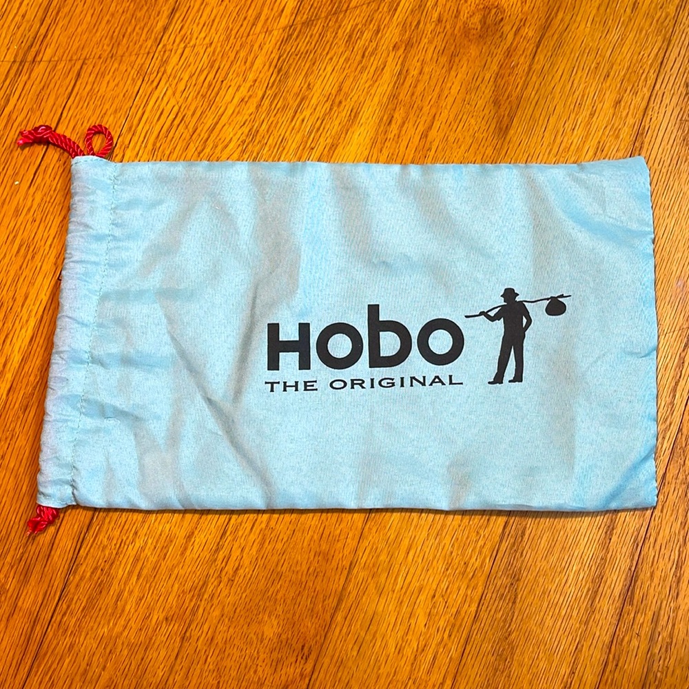 HOBO dust bag 11”x6”. Light teal with red accent.